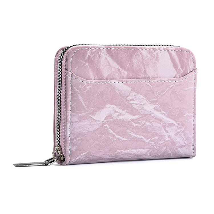 Lilac card and coin zipper wallet with silver-tone zipper pull and stitched panel.