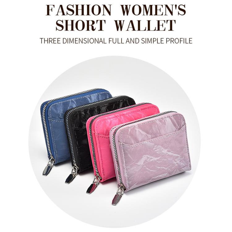 Set of compact zipper card coin wallets in blue, black, pink, and lilac.