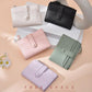 Assorted color litchi-texture coin card bags—flap snap and zipper, multi-card slots.