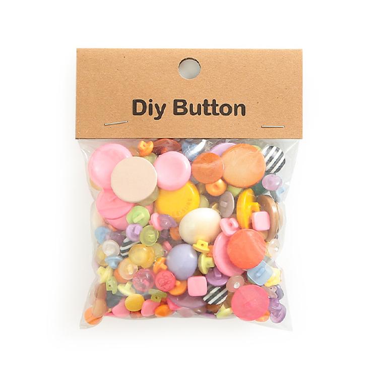 Round resin DIY buttons, pastel mix of pink, orange, yellow, and striped accents