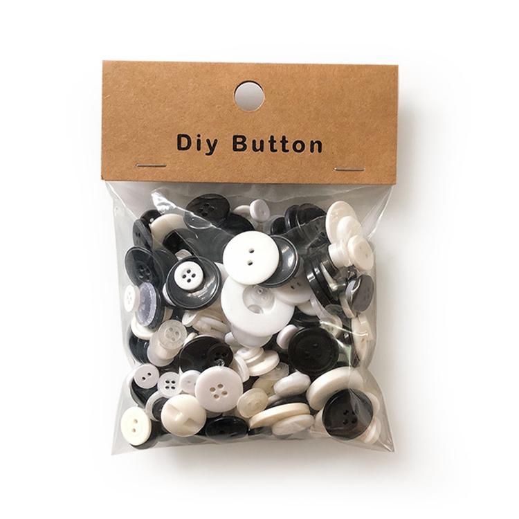Round resin DIY buttons, black and white mix in sealed bag