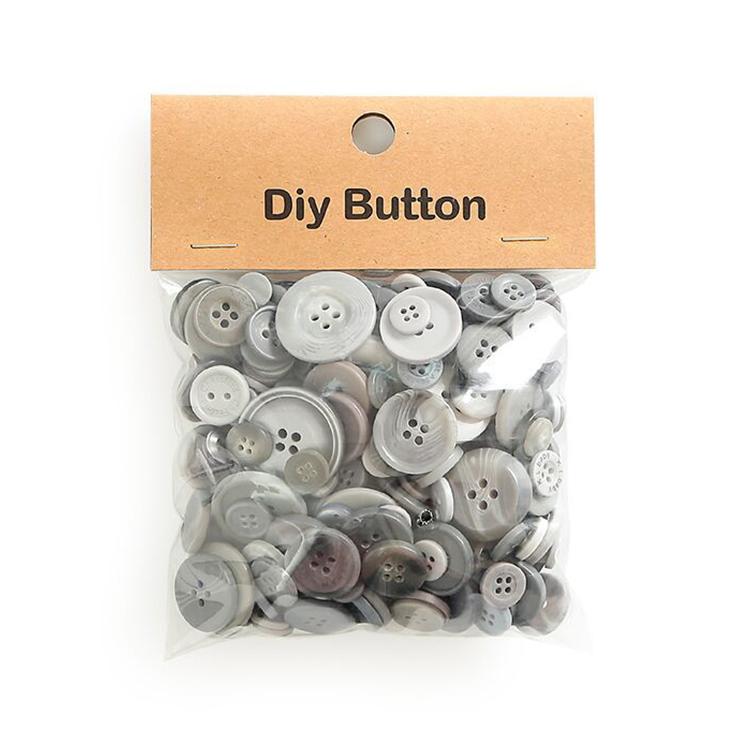 Pack of round resin buttons, gray and white mixed sizes with 2-4 holes, in clear bag