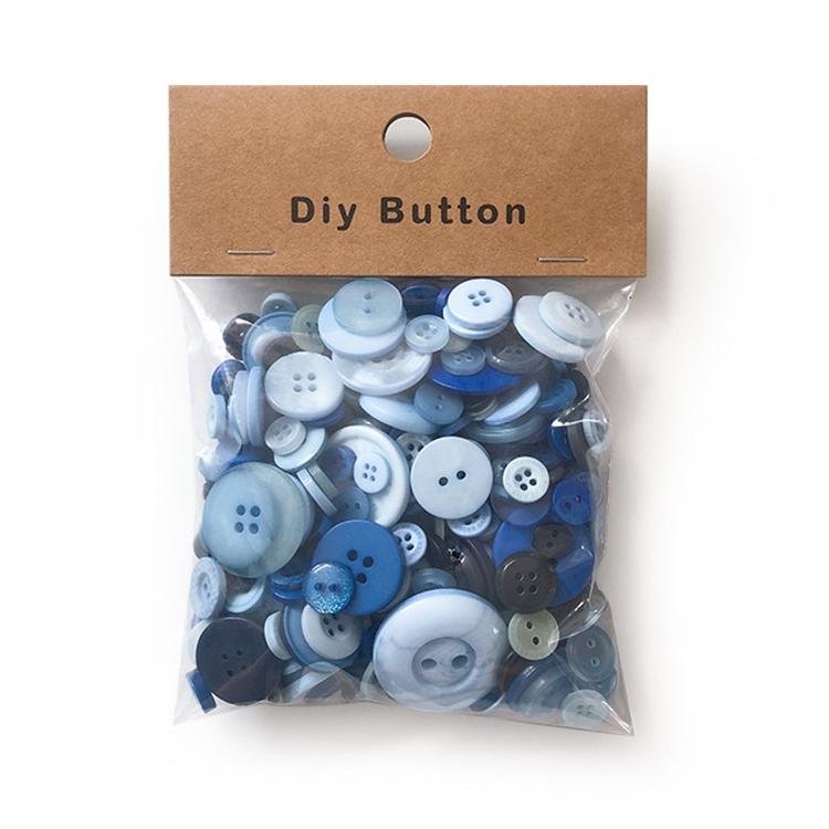 Pack of round resin buttons, blue mixed sizes with 2-4 holes, in clear bag