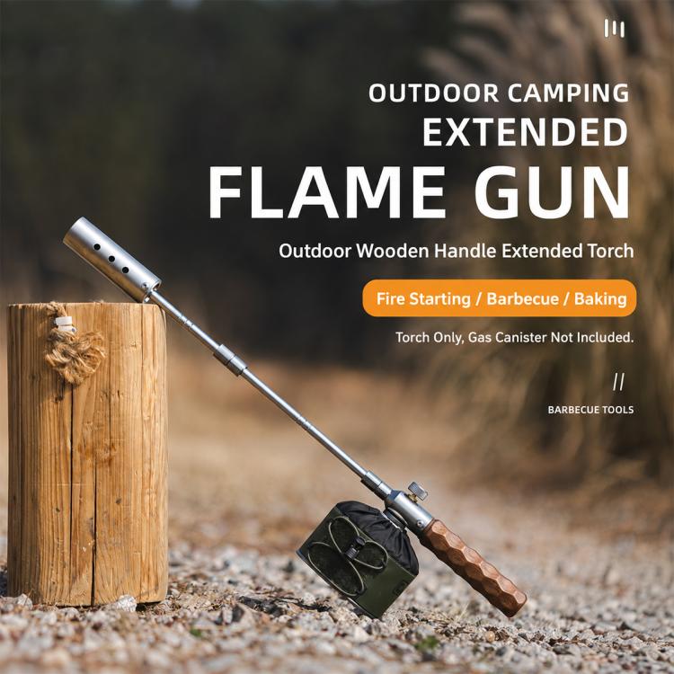 Outdoor extended flame gun with long metal tube and wooden grip, ready to ignite