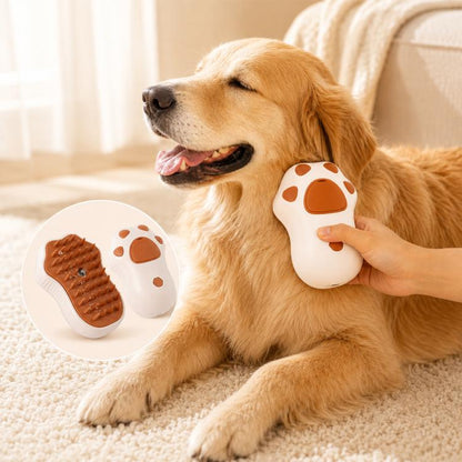 Cat Claws electric spray grooming brush in white with brown silicone pads, held near a dog