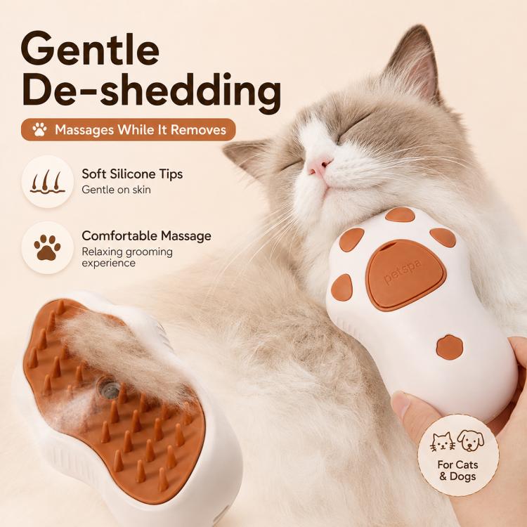Cat Claws de-shedding grooming brush with brown silicone tips, used on a white cat