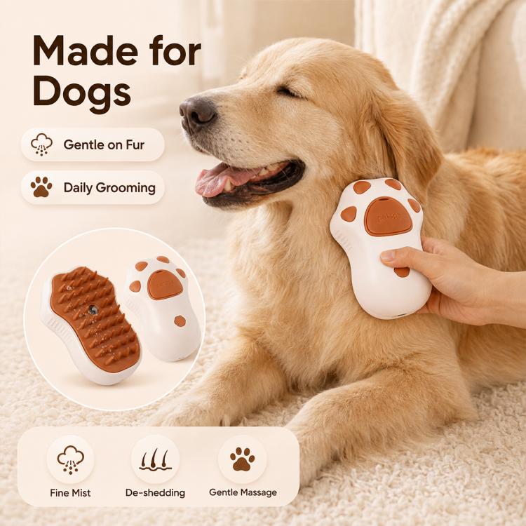 Cat Claws electric spray grooming brush with brown silicone pads, held on a golden dog