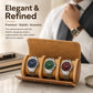 Tan leather three-slot watch case open with three watches inside