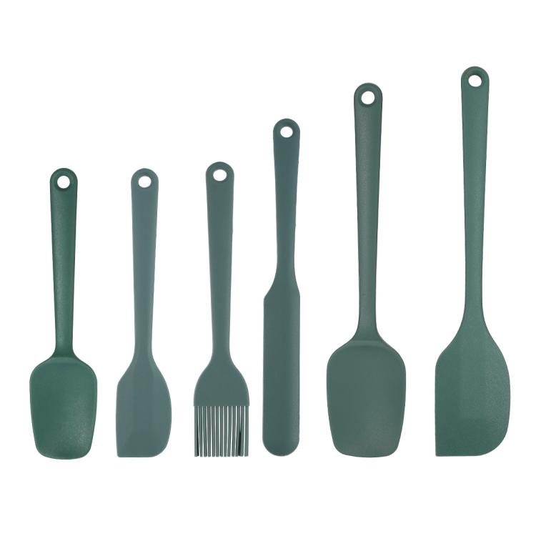 Green silicone baking utensil set with spatulas and oil brush heads