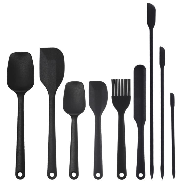 Black silicone baking utensil set with spatula, brush, and scraper heads