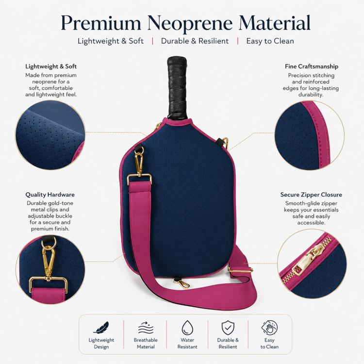 Navy blue neoprene paddle bag with magenta trim, gold hardware, and zip closure.