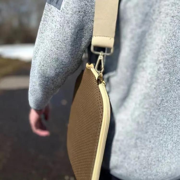 Grey neoprene paddle bag with zipper and gold-tone clip on single-shoulder strap