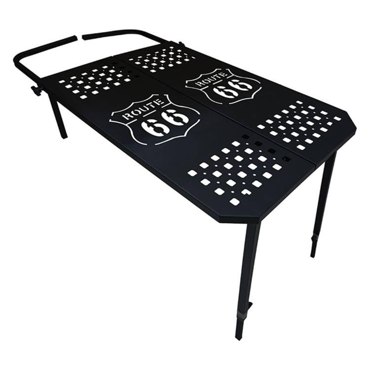 Portable folding metal dining table with perforated checkered top and cutout patterns.