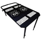 Portable folding metal dining table with perforated mosaic/checkered top and folding legs.