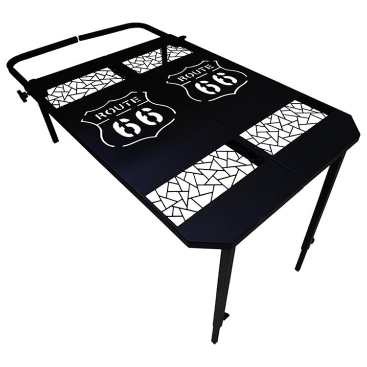 Portable folding metal dining table with perforated mosaic/checkered top and folding legs.