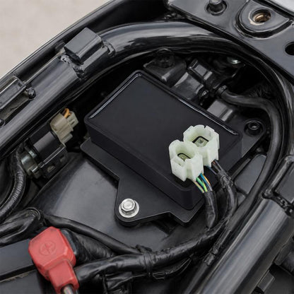 Black ignition control module with white 4-pin connector and wiring terminal block