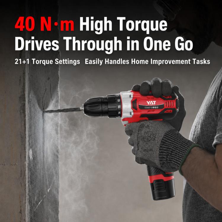 Cordless drill driver in use drilling into wall with red-and-black body