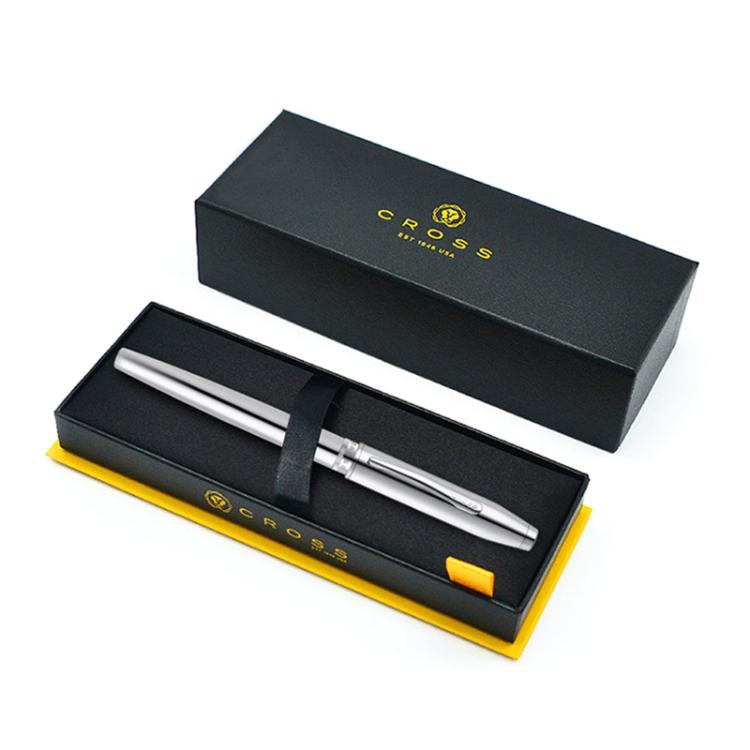 Silver rollerball pen in gift box, with metal barrel and black grip.