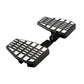 Black anti-slip footrest pedal pair with slotted tread and pivot mounting