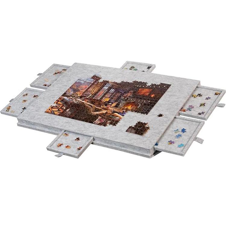 Light grey felt puzzle board with colorful scene insert and 6 sliding sorting drawer panels