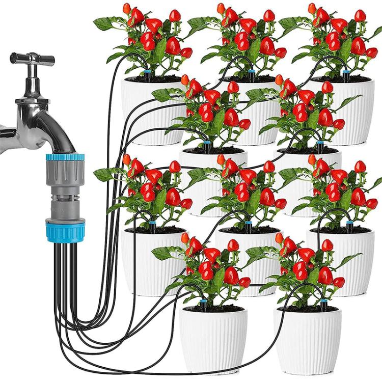 Drip irrigation system for potted plants with multiple black tubes and stakes