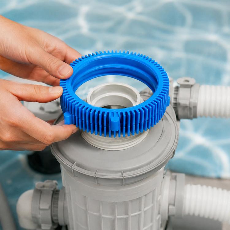 Blue pool cleaner tire belt ring with gear teeth and center hub