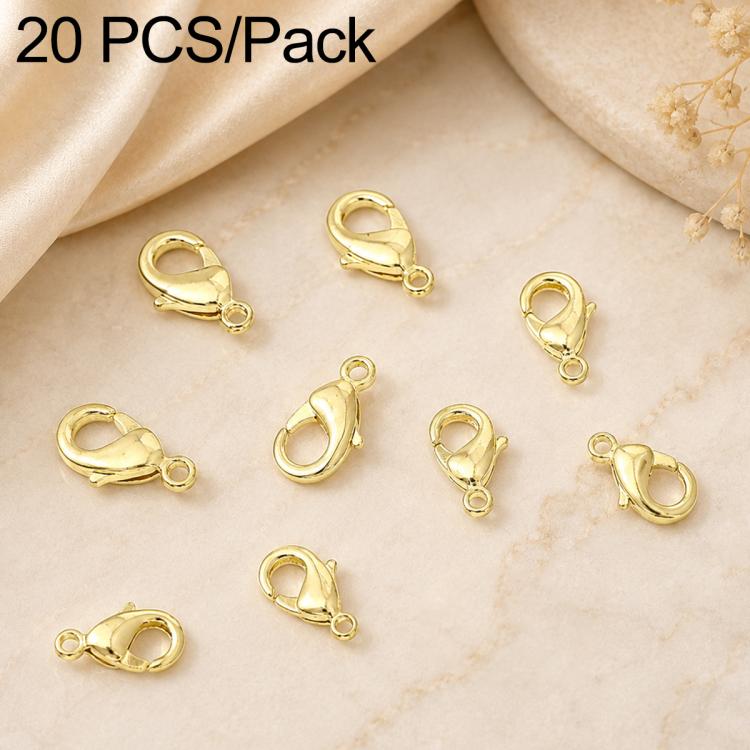 Gold-plated lobster clasp connectors with spring hooks, close-up of 20 pieces