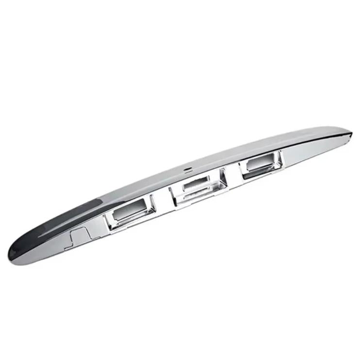 Chrome-and-black rear tailgate handle cover, long strip with recessed handle cutout.