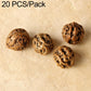 Rough natural brown seed beads with textured surface and visible small holes