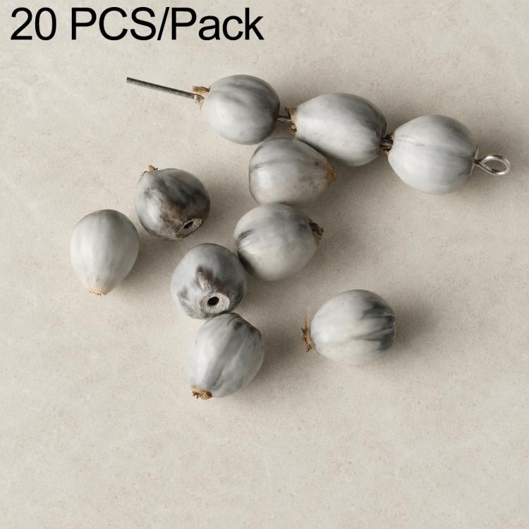 White and gray round seed beads with drilled holes, strung on a wire pin