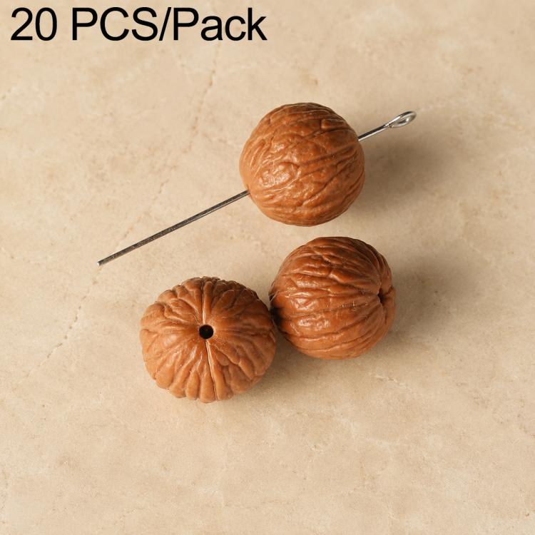 Honey-brown carved round seed beads with drilled holes on a pin for DIY jewelry