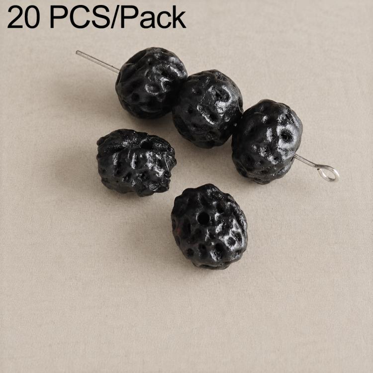 Black round seed beads with drilled holes and textured surface on a pin