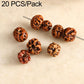 Carved brown seed beads with vertical holes, for DIY bracelet making.