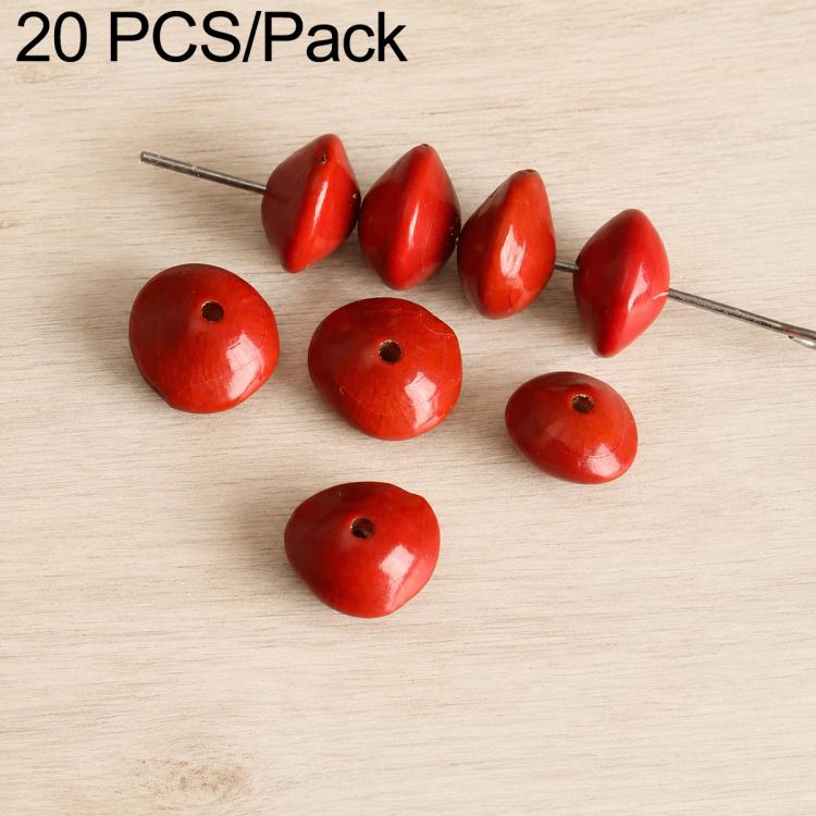 Polished red teardrop beads with small holes on metal pin.