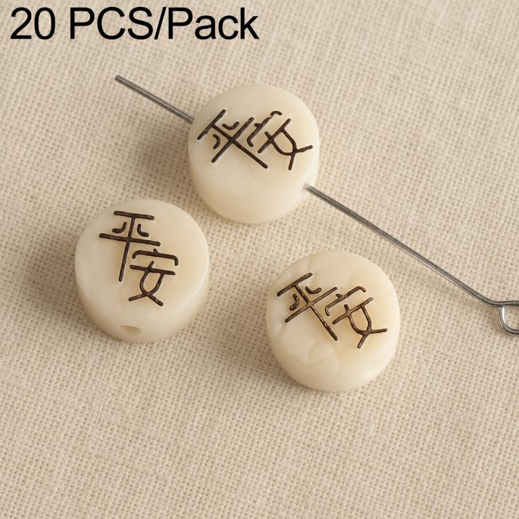 Cream seed beads with engraved characters, with through holes on metal pins.