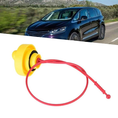 Engine oil dipstick with yellow cap and red wire loop, ball tip