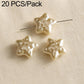 Beige star faux pearl beads with small raised detail, on metal pin stems
