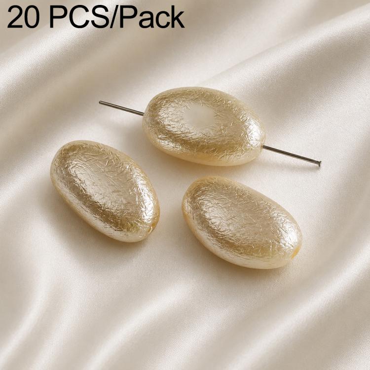 Gold oval teardrop faux pearl beads on metal pin stems