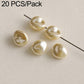 Cream round faux pearl beads with center shine on metal pin stems