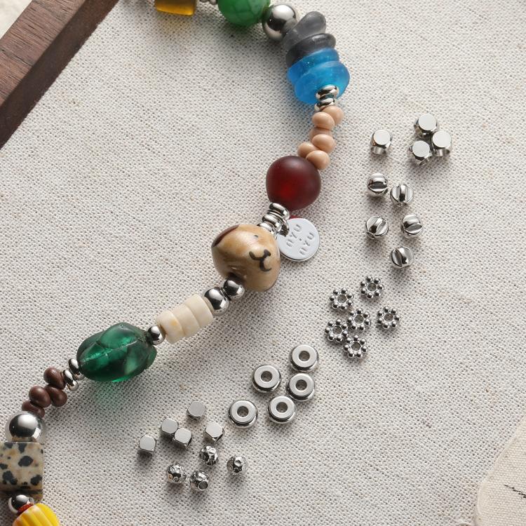 DIY phone charm strand with silver spacer beads and mixed colored accent beads