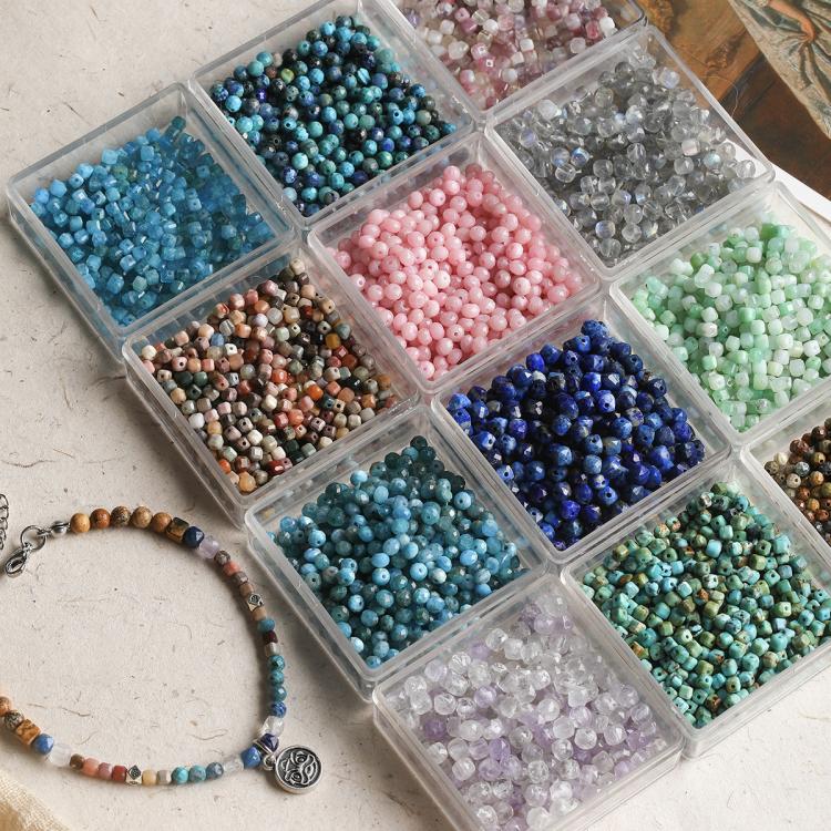Natural faceted bead assortment in mixed blue, pink, silver, green, purple, and brown compartments