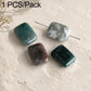 Natural tan rectangular stone beads with dark speckles and drilled hole for DIY jewelry.