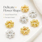 Gold and silver snowflake bead cap spacers, close-up of flower-like beads with center holes