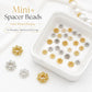 Small mixed gold and silver snowflake bead cap spacers in square tray, assorted set