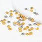 Gold and silver snowflake bead cap spacers scattered, flower-like heads with center holes