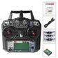 FlySky FS-I6X transmitter with dual throttle controls, LCD screen, and side switches
