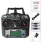 FlySky FS-I6X remote transmitter front view with green LCD and control switches