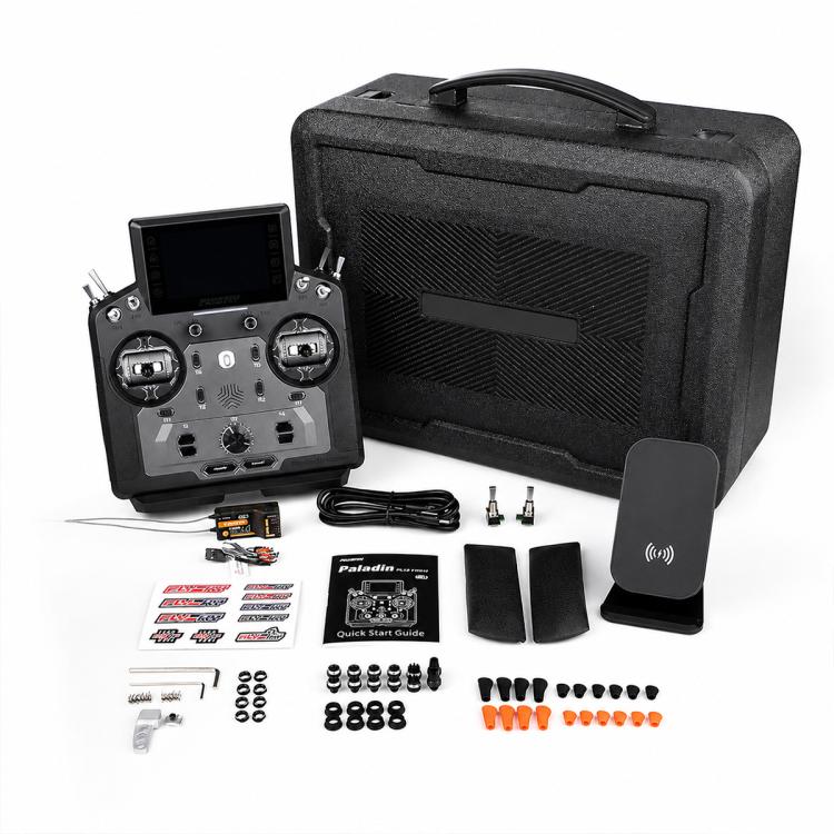 RC radio transmitter set with remote, protective case, and small accessory items