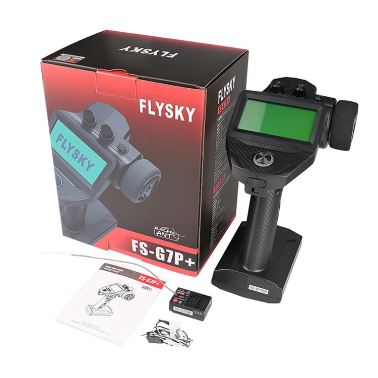 FlySky FS-G7P+ RC transmitter with green LCD, handheld grip, box and manual