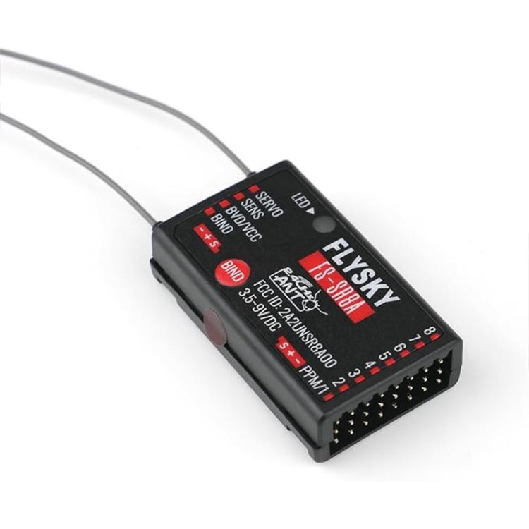 Black FlySky FS-SR8A receiver close-up with wiring connectors and channel pin row